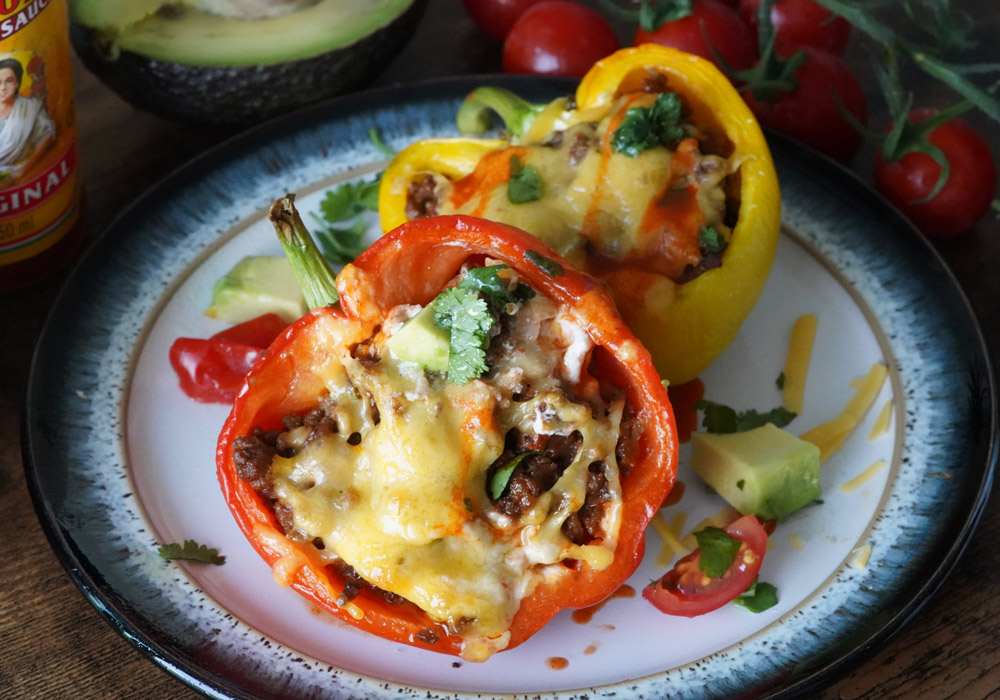 https://delightfullylowcarb.com/wp-content/uploads/2020/02/taco-stuffed-peppers-w1.jpg