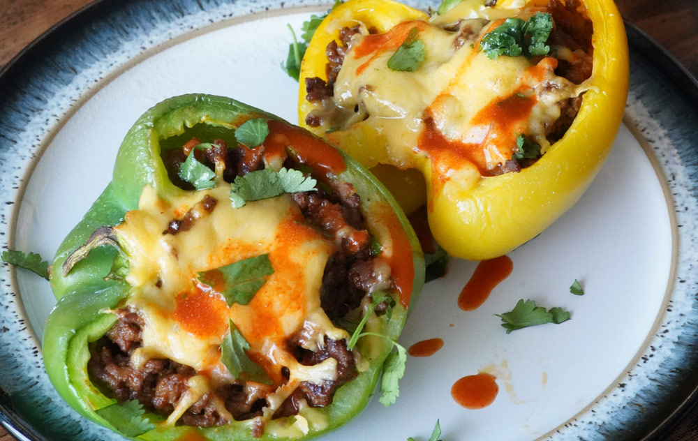 https://delightfullylowcarb.com/wp-content/uploads/2020/02/taco-stuffed-peppers-w2.jpg