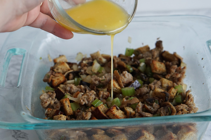 drizzling butter over stuffing