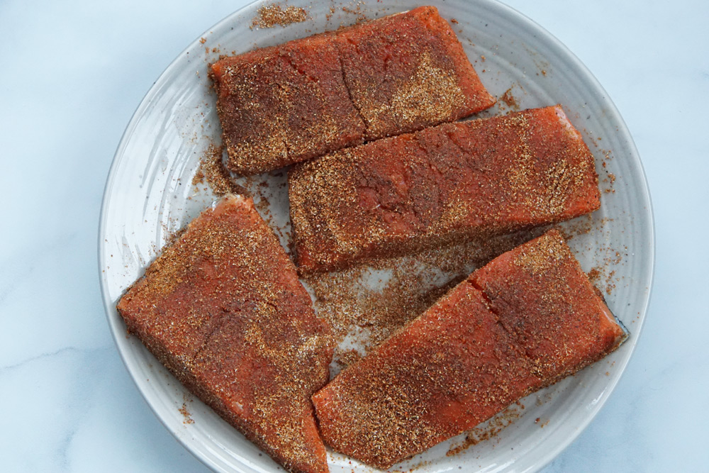 Raw salmon with blackening seasoning