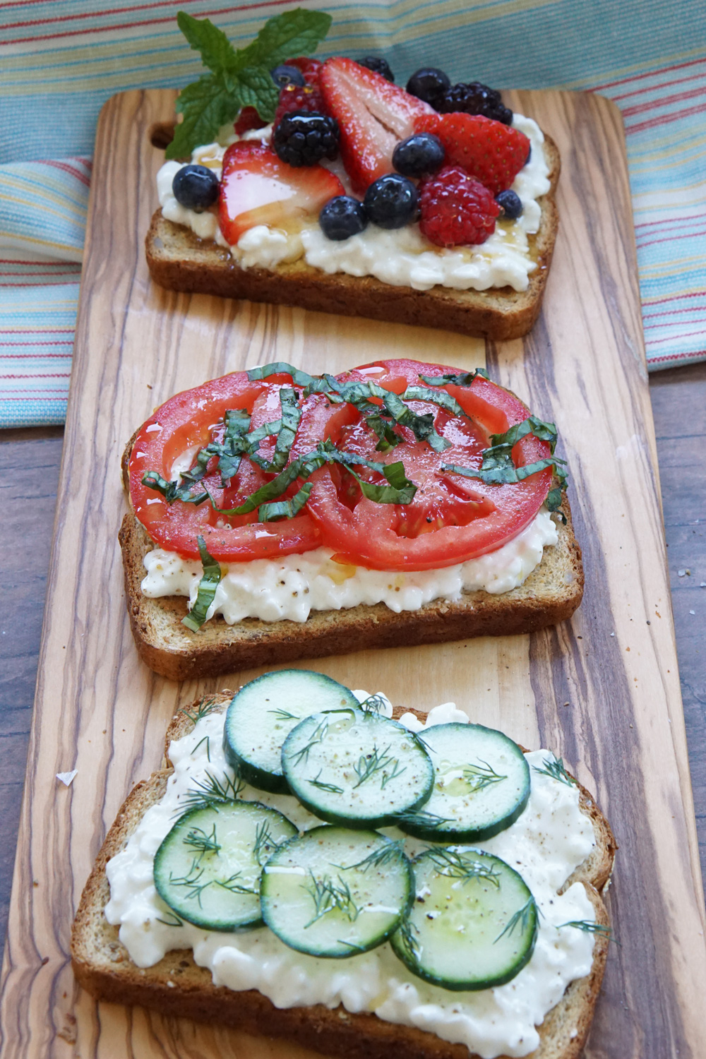 Cottage cheese toast. Berries, tomato and basil and cucumber dill.