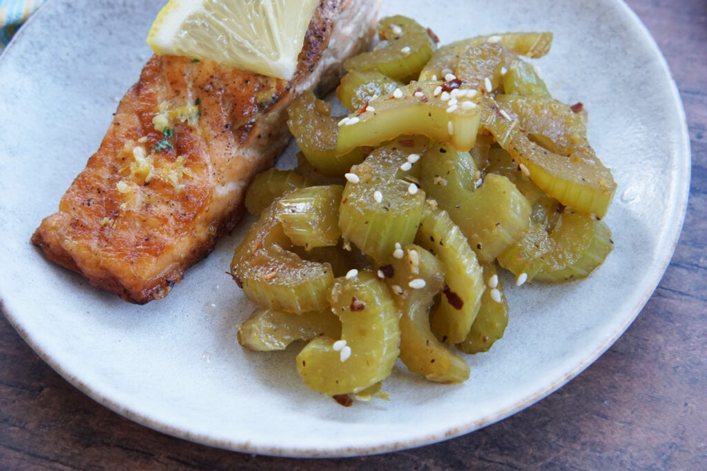 Sautéed celery with a salmon fillet